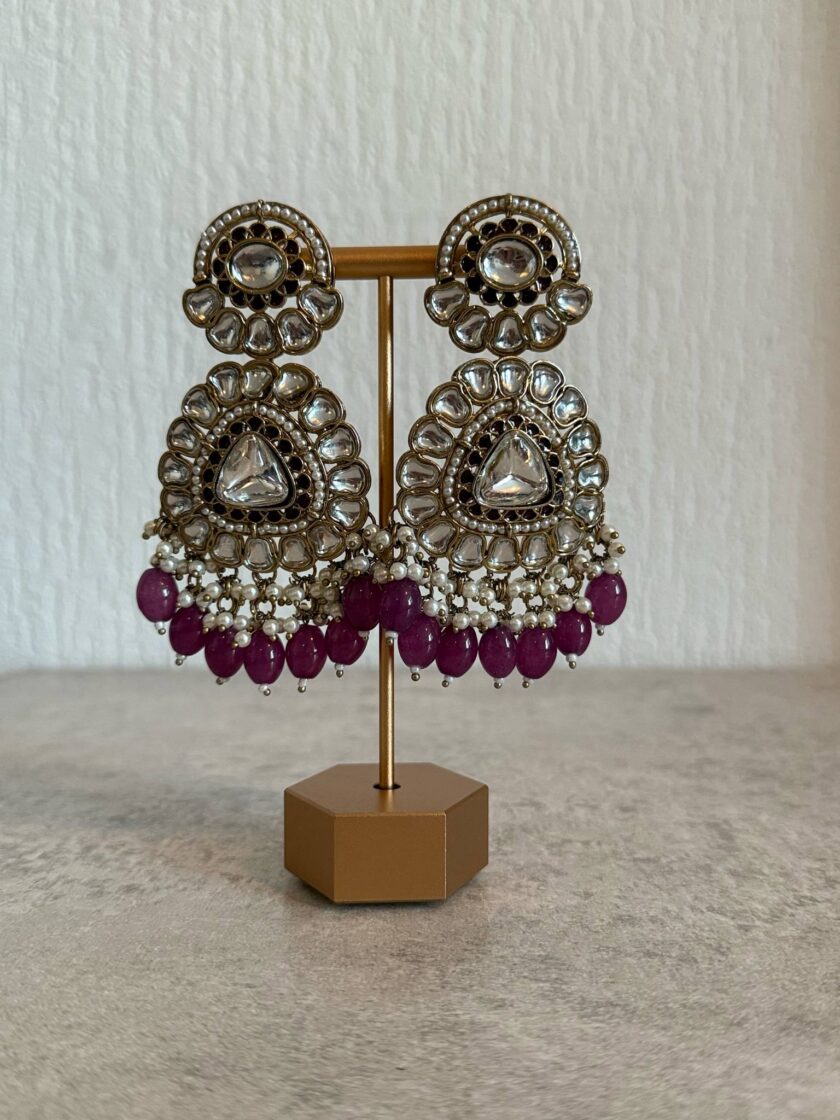 Oorbellen goud met paars 01655