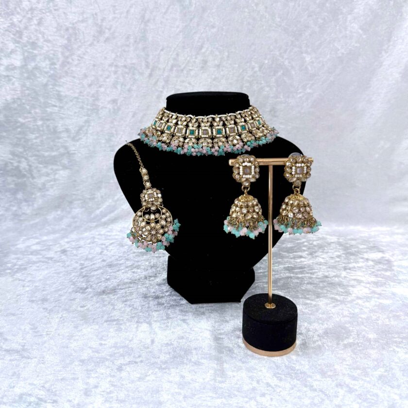 Sieradenset goud met lichtroze/lichtblauw 01753